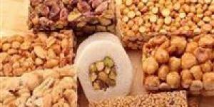 الإفتاء تحسم الجدل حول حكم شراء حلوى المولد والتهادي بها